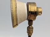 a lamp that is on top of a pole