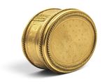 gold coin on a white surface with a white background