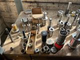many different types of tools sitting on a table