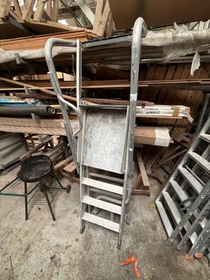 a ladder that is leaning against the wall