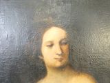 un tableau représentant une femme portant une bague au nez