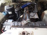 a picture of a car engine in the back of a truck
