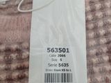 a label on a sweater that says slumberry