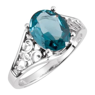 bague en topaze bleue rehaussée de motifs en filigrane
