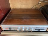 a stereo system that is sitting on top of a table