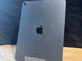 an apple ipad is sitting on top of a wooden table