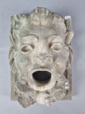 une image représentant une sculpture représentant une tête de lion