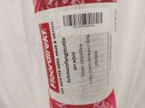 a red tube of toothpaste on a white background
