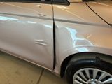 a picture of a car that has been badly damaged
