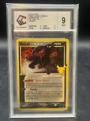 a close up of a pokemon card on a table