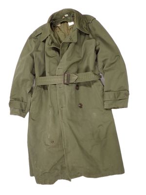 an image of a green trench coat with a belt on a white background