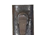 a metal object with a hole in it on a white background