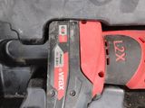 an image of a cordless tool in the back of a truck