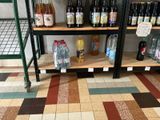 many bottles of wine on the shelves in the store