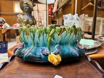 a vase that is sitting on a table in a room