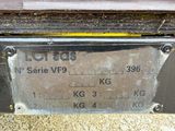 a close up of a metal plate with numbers on it
