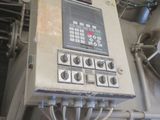 a machine that is sitting inside of a building