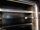 a metal shelf that has a bunch of shelves in it
