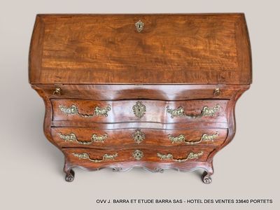 a small wooden desk with a drawer on top of it