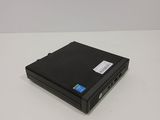 a close up of a laptop computer sitting on a white surface