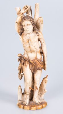 an image of a statue of a man with a bird on his shoulder