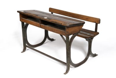 an old school desk with a wooden bench on it