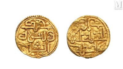 two gold coins, one of which has a design on the front and the other of which has a design on the back