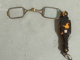 a close up of a pair of glasses on a table