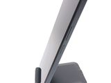 a cell phone that is sitting on top of a stand