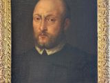 portrait of a man with a beard in a gold frame