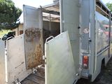 two pictures of a truck that has a door open