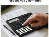 a person using a calculator on a piece of paper