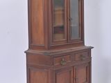 an image of a wooden china cabinet with a glass door