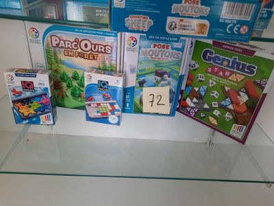 a lot of games on display in a glass case
