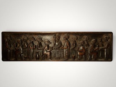 a bronze plaque depicting the baptism of jesus and his family
