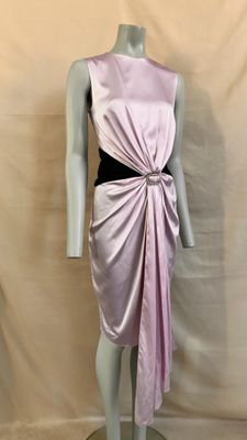 an image of a mannequin dressed in a pink and black dress