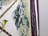 a picture of a scarf with a picture of a man playing a trumpet