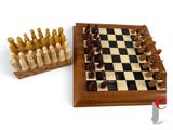 a chess board and a chess set on a table