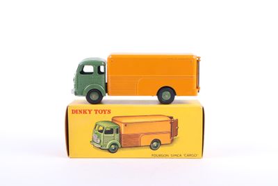 two toy trucks sitting next to each other on top of a box
