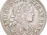 une pièce d'argent portant une tête de femme et une couronne