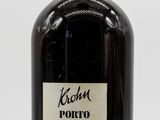 a bottle of wine that is sitting on a table