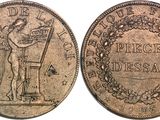 a coin with a picture of a man on it