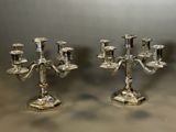 pair of silver plated candelabs with candlesticks on stands