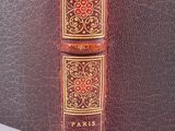 three books that are stacked on top of each other