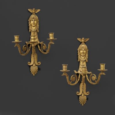 pair of gilet wall sconces in the form of a woman and a man