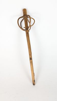 an image of a wooden stick with a metal handle on a white background