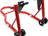 two red bicycle stands with black wheels on a white background