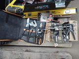 many tools that are laying out on the floor