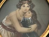 a picture of a woman and a child in a picture