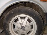 a car that has a flat tire on the ground